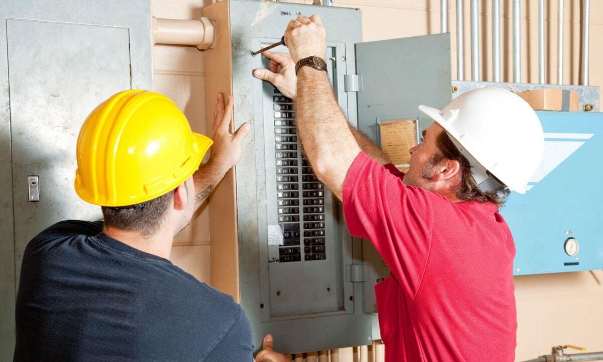 electricians-working-repair-breaker